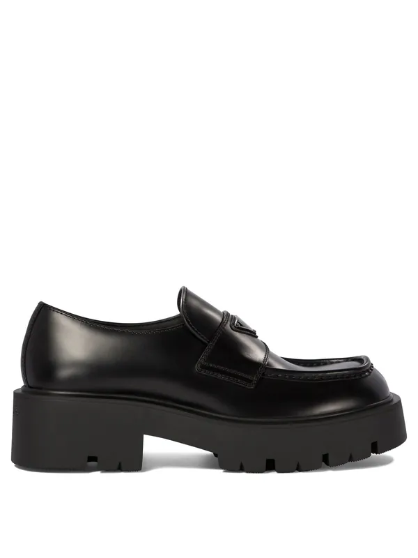 Brushed Leather Loafers & Slippers Black - Prada