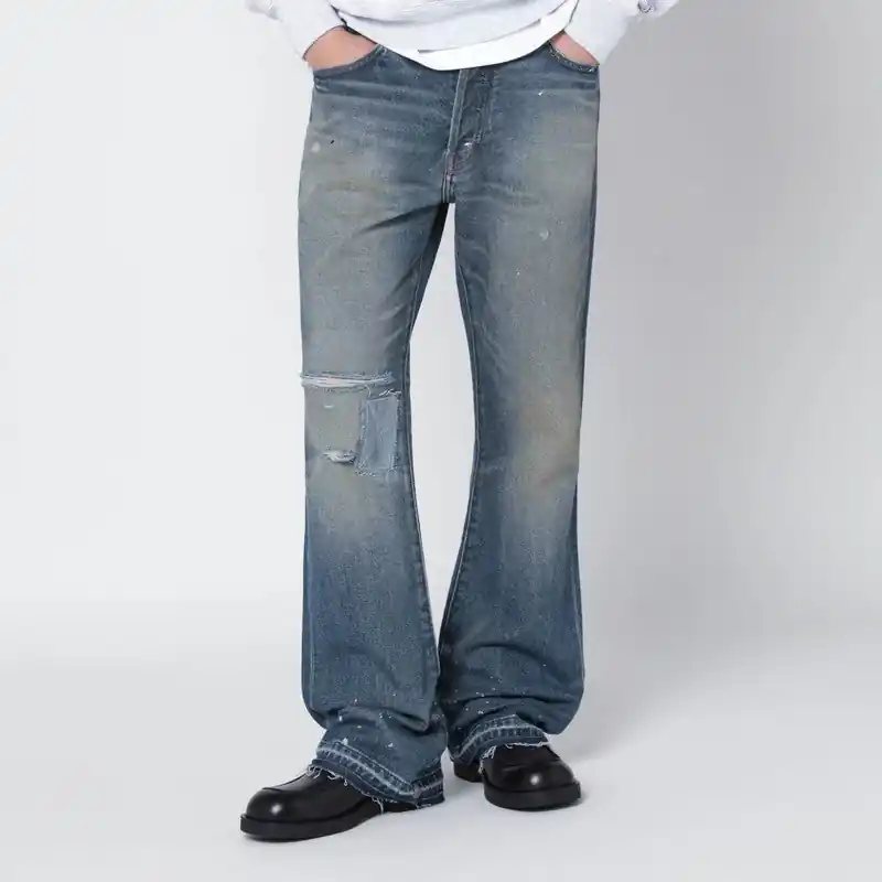Faded Indigo Jeans With Rips - Gallery Dept.